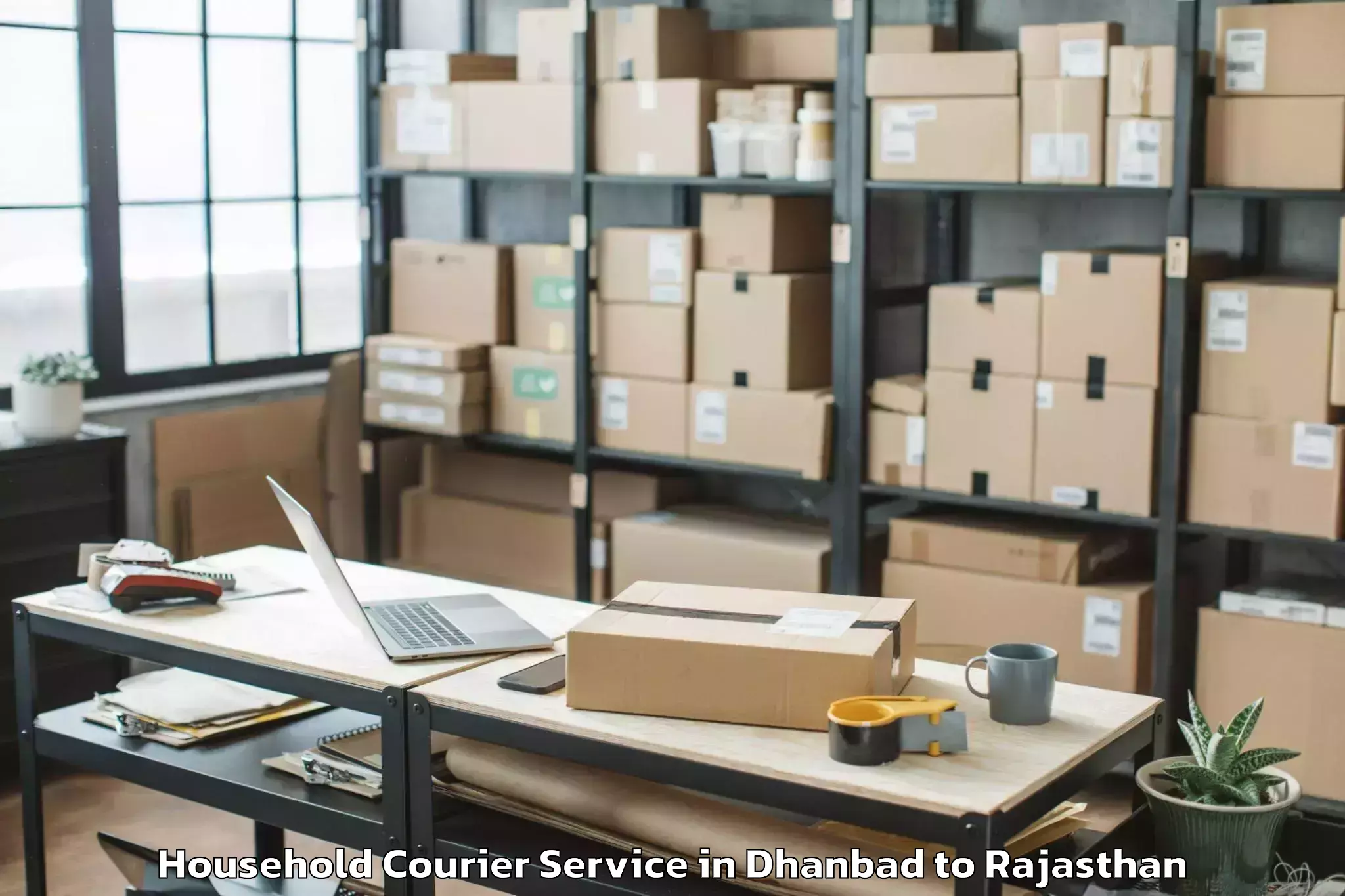 Top Dhanbad to Jk Lakshmipat University Jaipu Household Courier Available